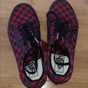 Red and black checkered vans